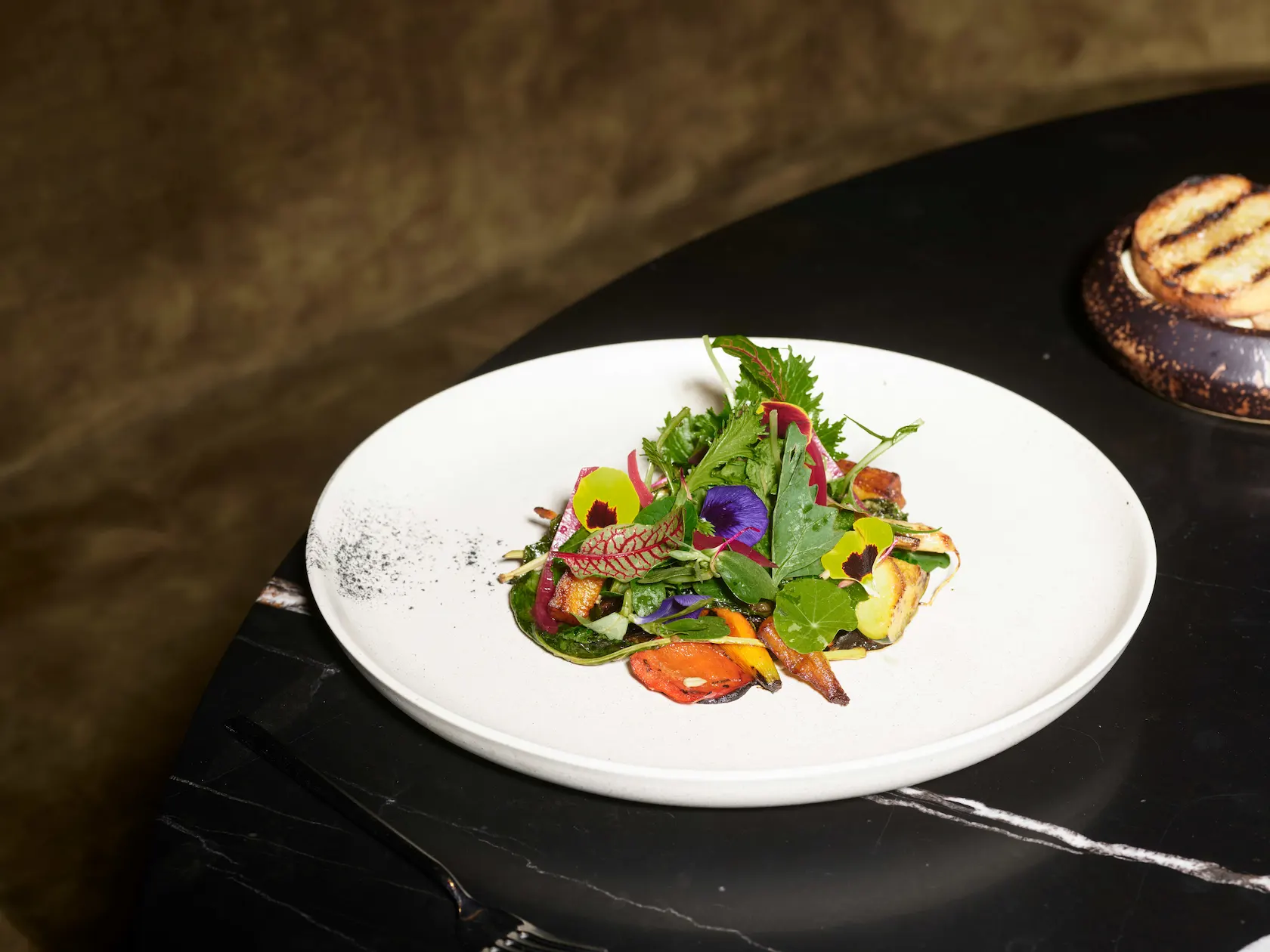 Salad served at Autor restaurant in Conrad Tulum Riviera Maya hotel.