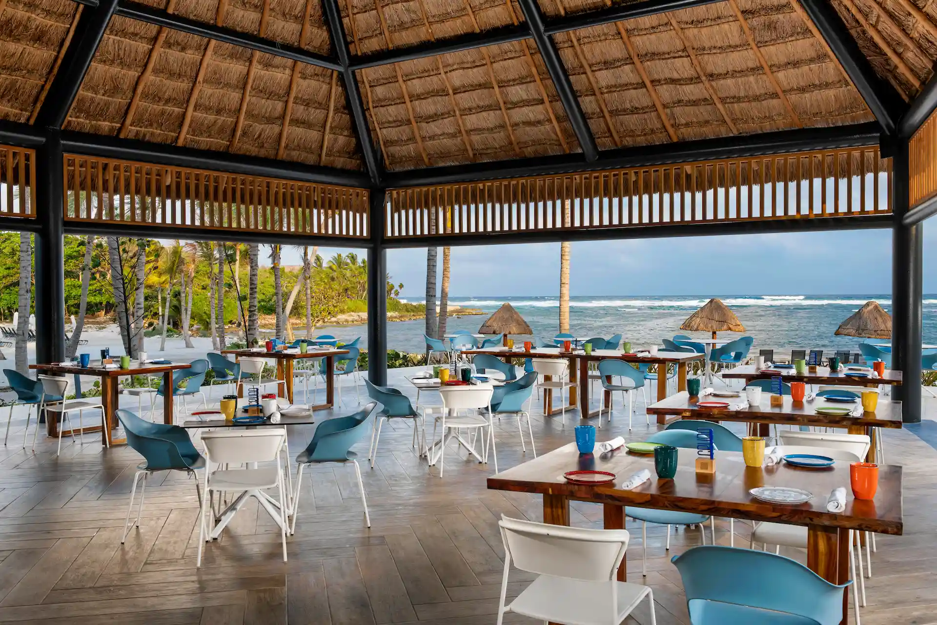 Sunny terrace of the Chiringuito beach bar at Conrad Tulum Riviera Maya