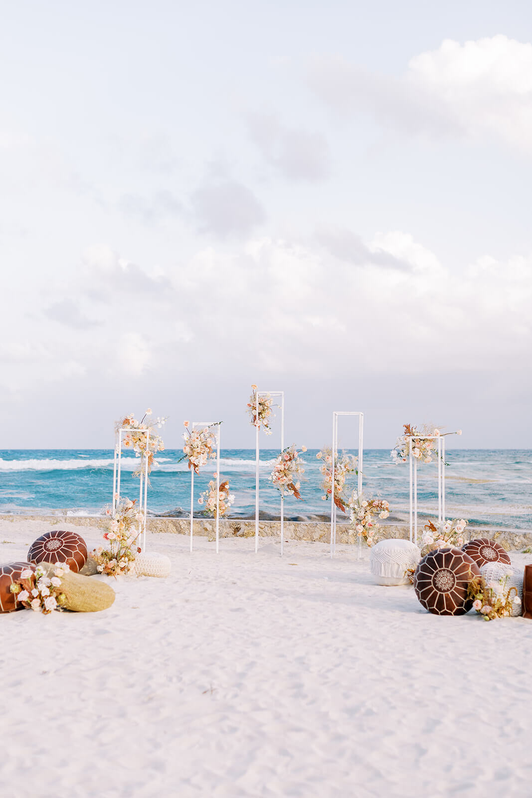 Charming beach wedding decorations at Conrad Tulum