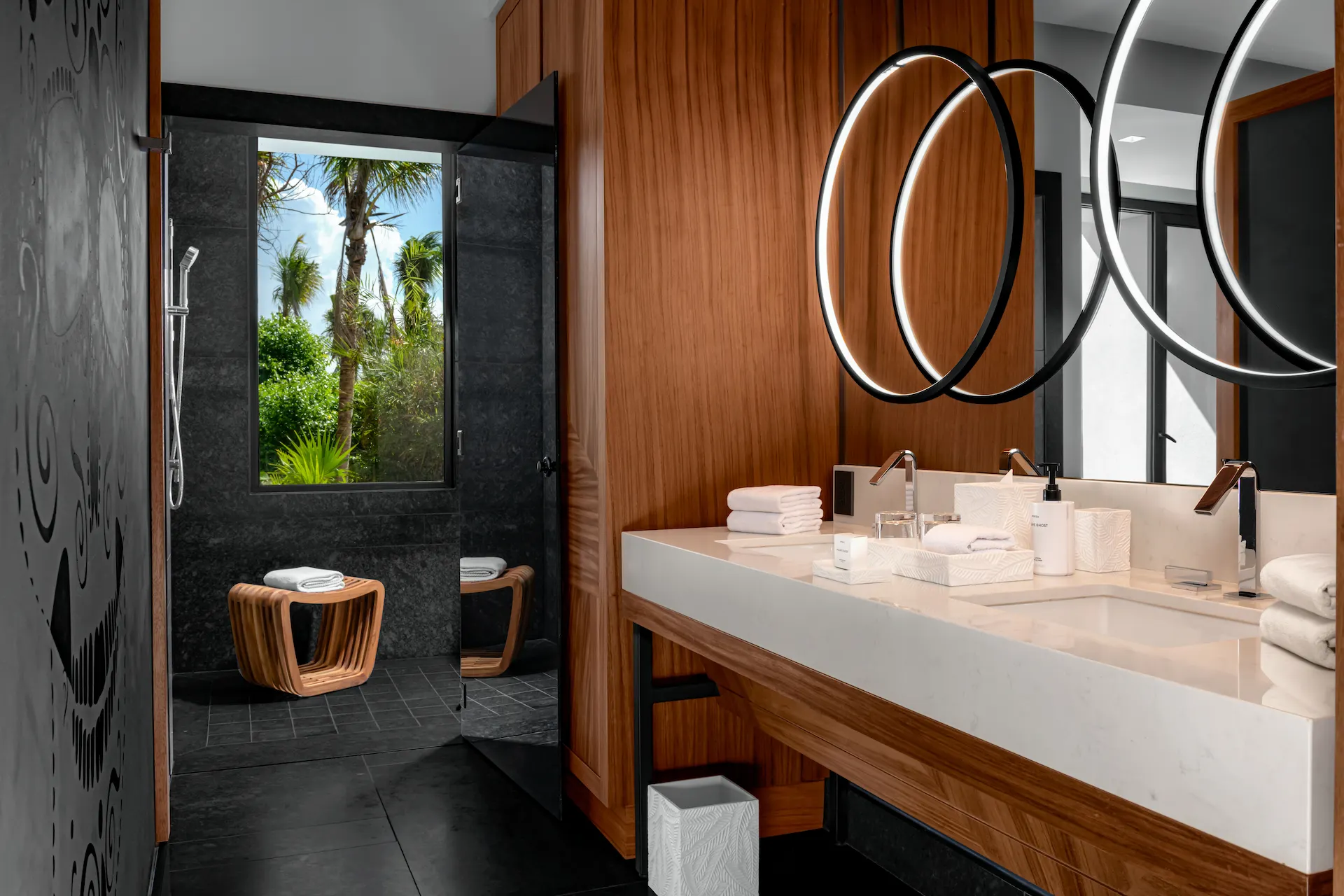 Elegant bathroom interior of a suite at Conrad Tulum, featuring modern fixtures and a luxurious design