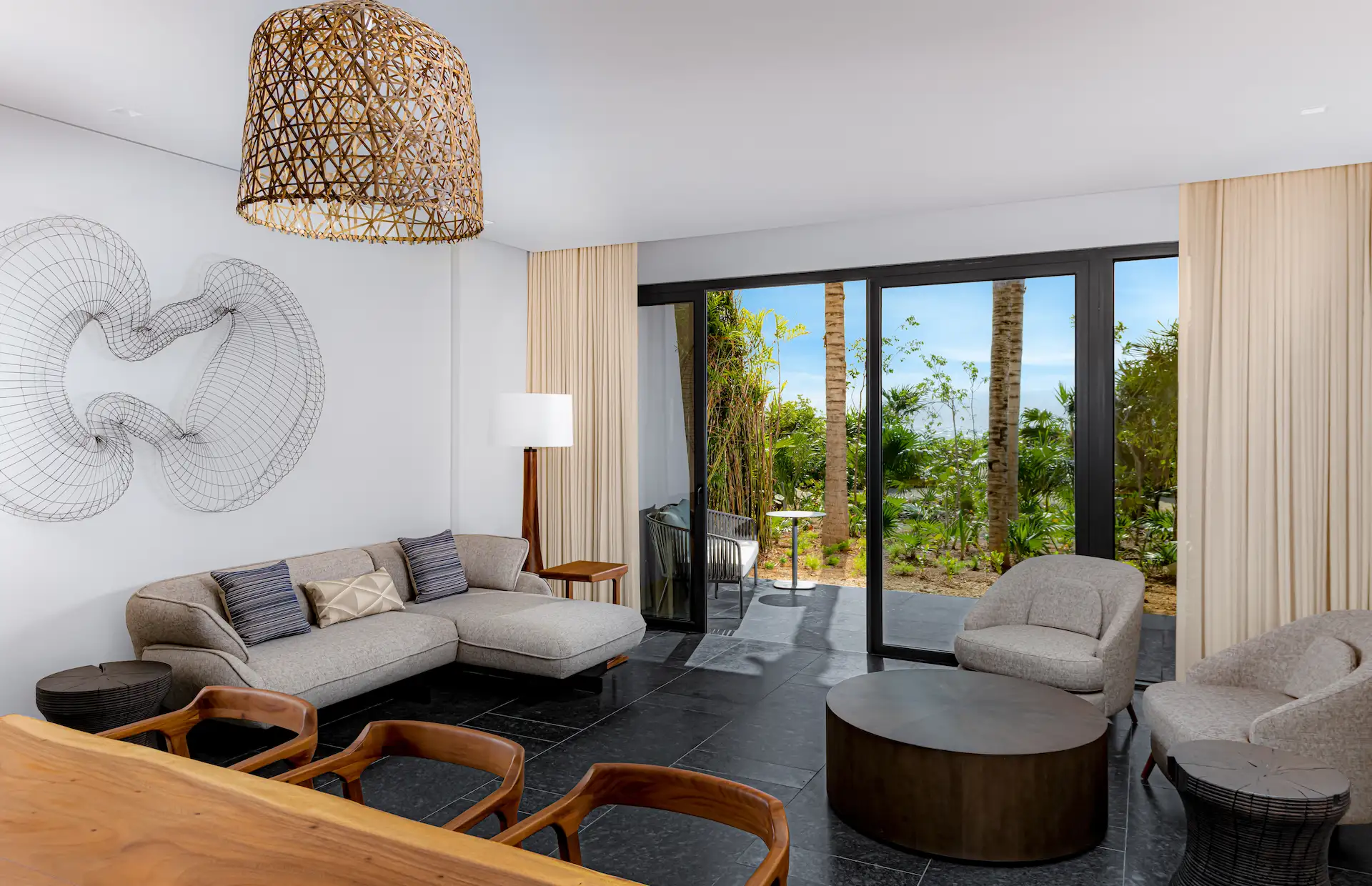 Interior of a room at Conrad Tulum Riviera Maya featuring elegant design, modern furniture, and a relaxing ambiance.