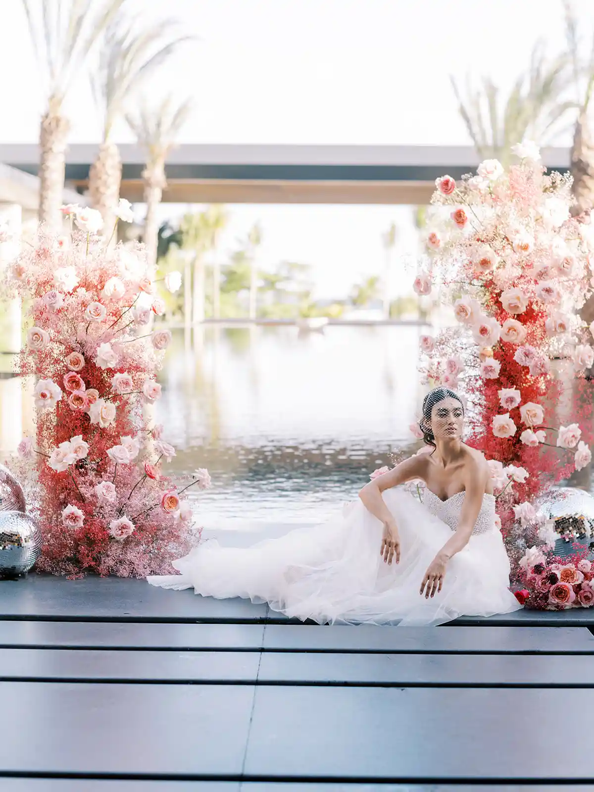 Woman posing for a photo on her wedding day at Conrad Tulum Riviera Maya hotel