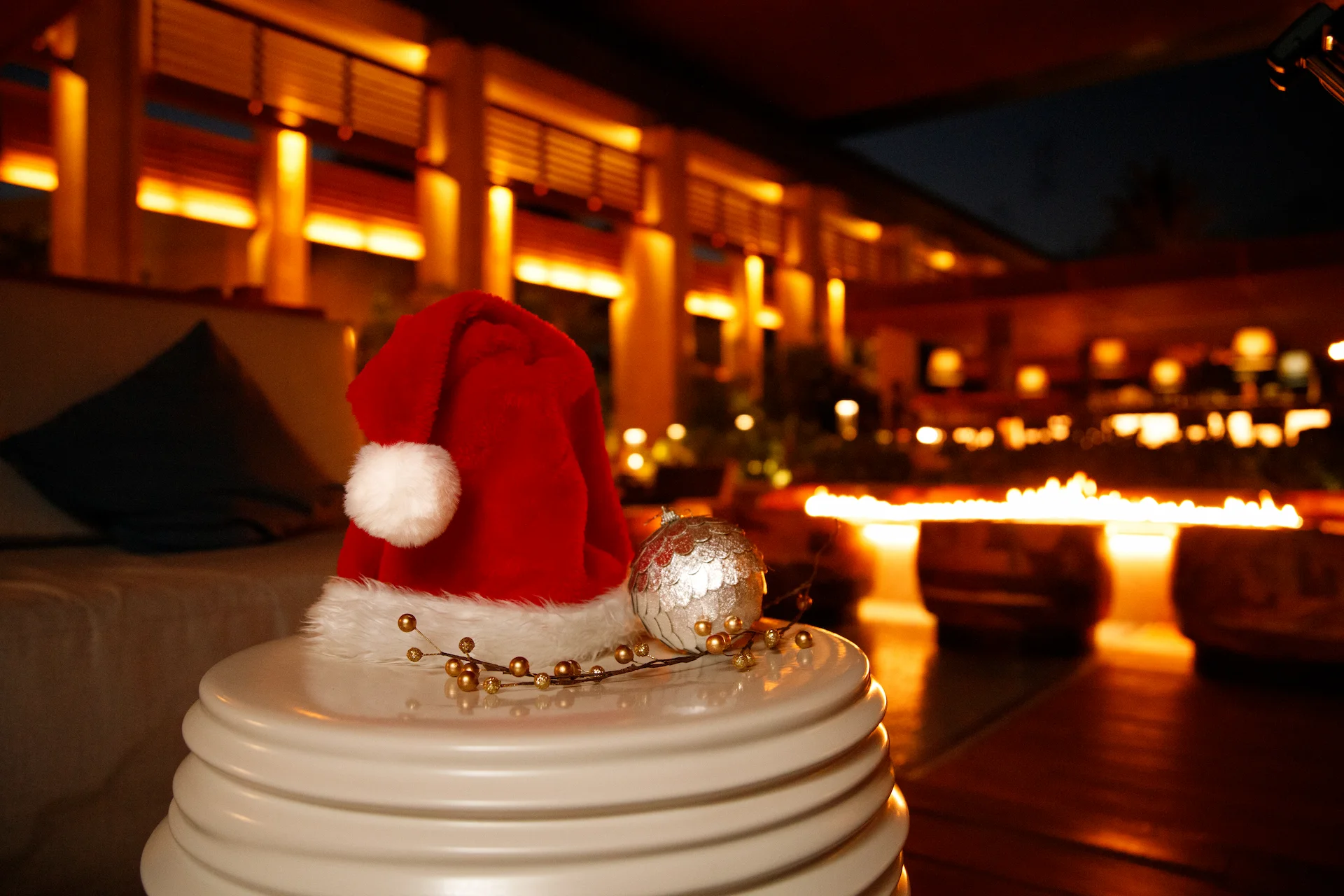 Christmas decorations displayed above plates in the Conrad Tulum Riviera Maya hotel restaurant